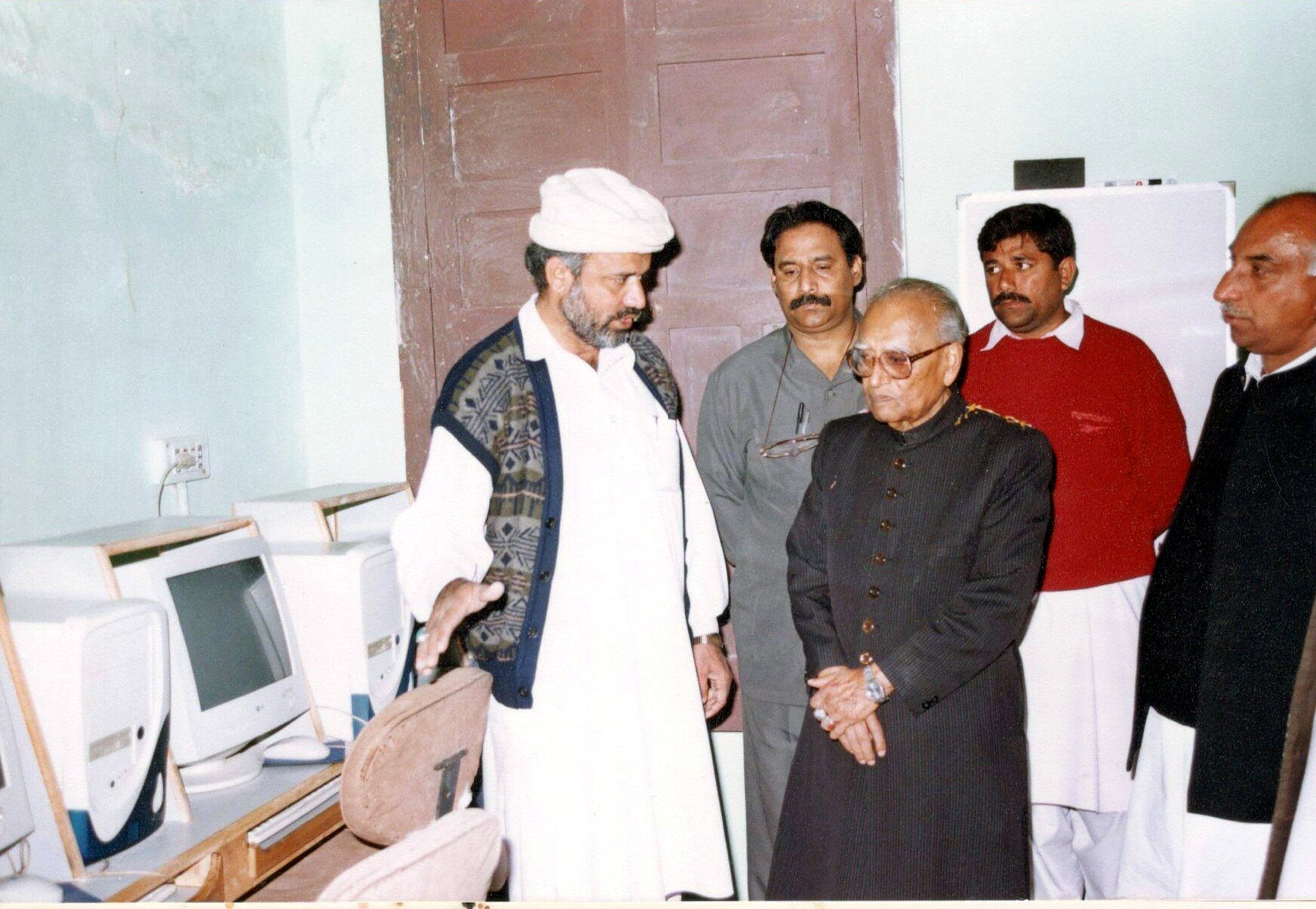 Representatives visiting a computer learning centre