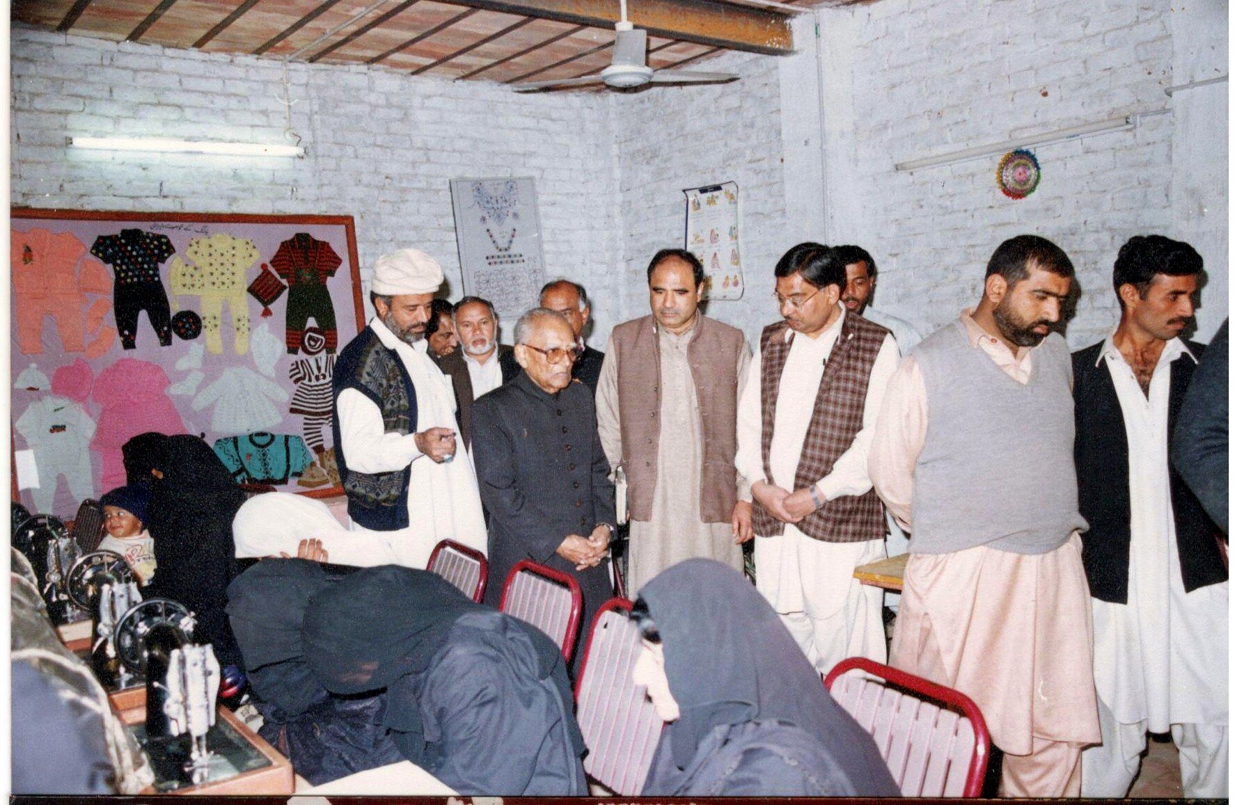 Community representatives visiting a women’s vocational training centre