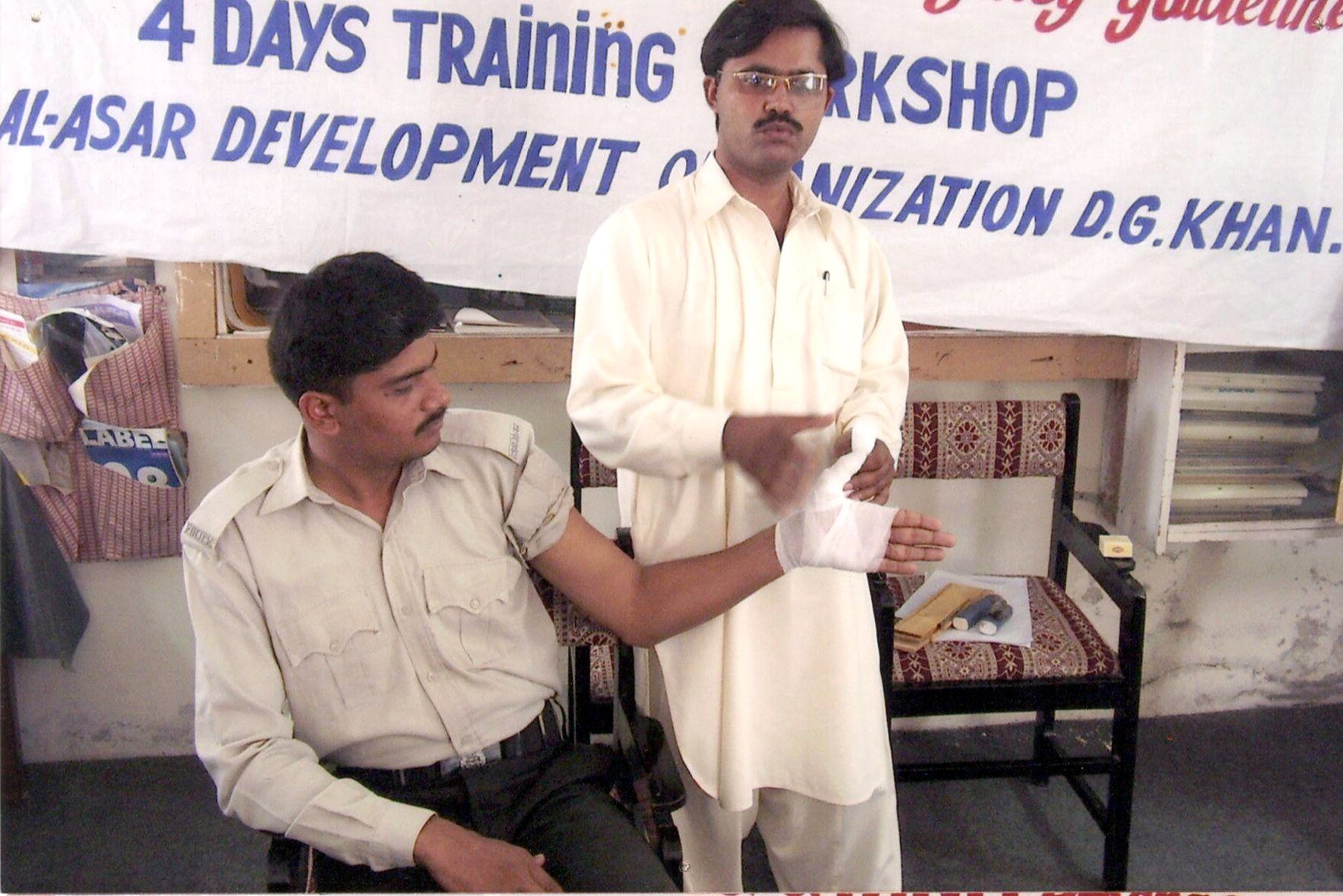 Participant practising first aid during a training workshop